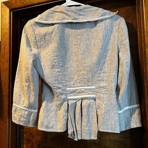 Grey 3/4 Length blazer. Claims to be a size 6. But fits small. Bebe collection.